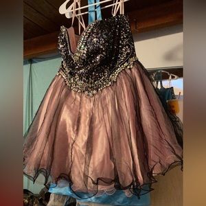 SOLD Selling my corset back short pink and black dress I bought for prom 2 ya